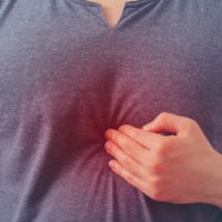 Man with chest pain from acid reflux